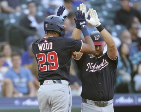 Hassell hits 1st major league homer and Nationals rout Mariners 9-0