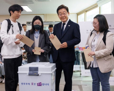 South Koreans turn out in record numbers for early voting as presidential hopefuls vow change