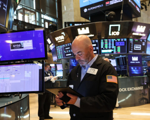 Stocks waver as Wall Street digests tariff uncertainty