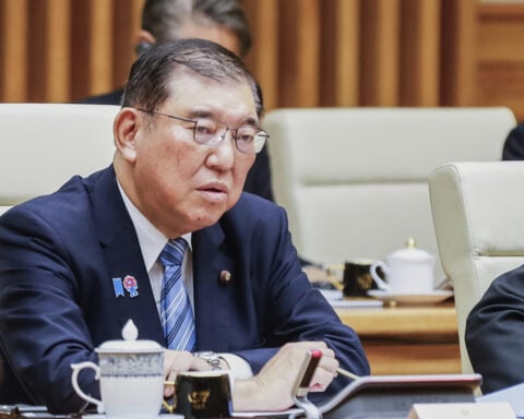 Japan's Ishiba warns against tension over tariffs and vows to expand Asia-Pacific trade group