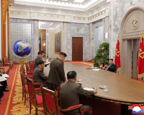 North Korea's Kim Jong Un leads meeting on strengthening military, inspects artillery drill