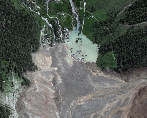 Flood risk threatens Swiss valley after village destroyed by glacier