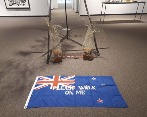 A controversial flag invited art gallery visitors to 'please walk on me.' It lasted 19 days