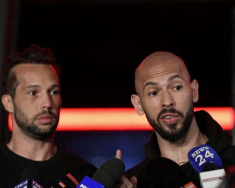 Tate brothers will return to UK to face charges after Romanian legal proceedings, lawyers say