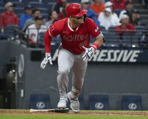 Trout returns to Angels' lineup in a new spot and has a hit in win over Guardians