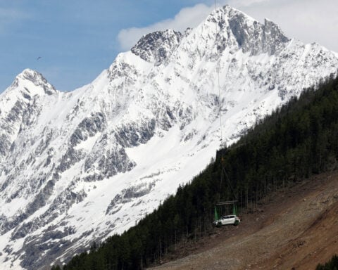 Flood risk threatens Swiss valley after glacier destroys village