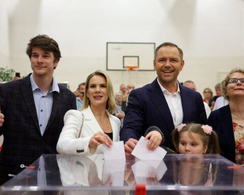 Poland's Nawrocki swings into a narrrow lead in presidential vote