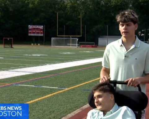 Twins, one with cerebral palsy, compete together at Massachusetts track event. "This is the happiest kid."