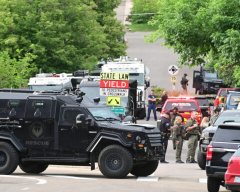 Man attacks Colorado crowd with firebombs, 8 people injured
