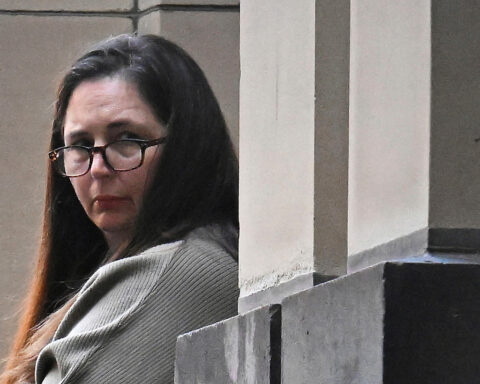 An Australian woman on trial for triple murder testifies over mushroom poisoning