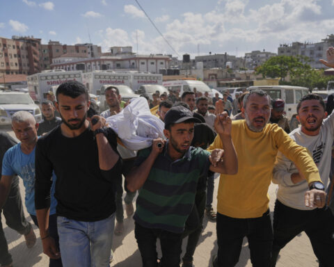 An Israeli strike on Gaza kills 14 Palestinians, mostly women and children, hospitals say