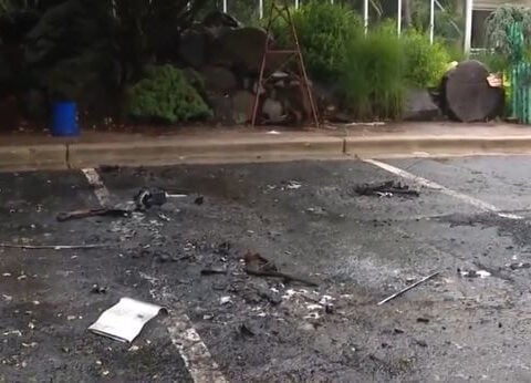 Two teens arrested in connection with body found in burnt car