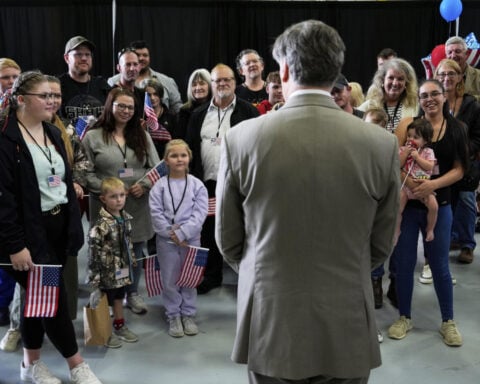 More white South Africans arrive in the US under a new refugee program