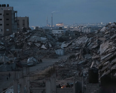 Israeli forces open fire a kilometer away from Gaza aid site, killing 3, health officials say