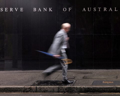 Australia central bank says higher US tariffs a drag on global economy