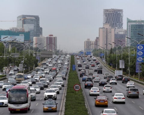 China car dealers urge automakers to stop dumping inventory on them