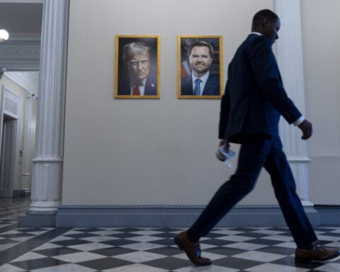 The Latest: Musk slams Trump-backed plan to cut taxes and spending