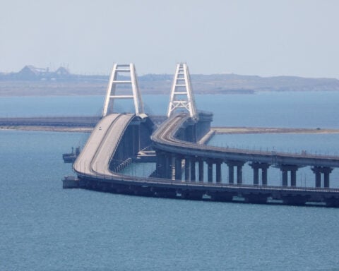 Ukraine says it hit Russia's bridge to Crimea with underwater explosives