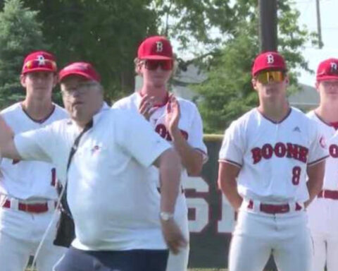 'He does everything:' Lifelong Iowa sports fan throws first pitch as he transitions to hospice
