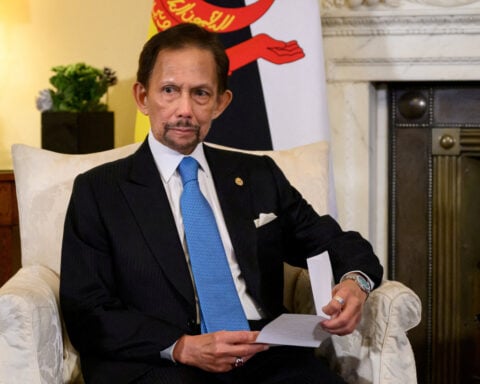 Brunei ruler returns home after hospital admission in Malaysia