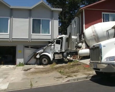Cement truck crashes into homes, no injuries reported