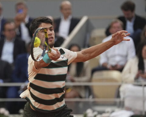 French Open: Carlos Alcaraz beats a hurting Tommy Paul 6-0, 6-1, 6-4 to return to the semifinals