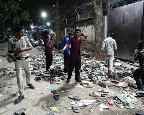 At least 11 people die in a stampede outside a cricket stadium in India after IPL win