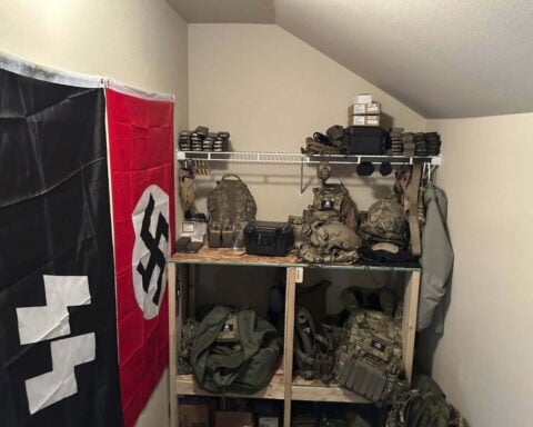 2 arrested with arsenal and Nazi paraphernalia after base robbery were ex-military, prosecutors say