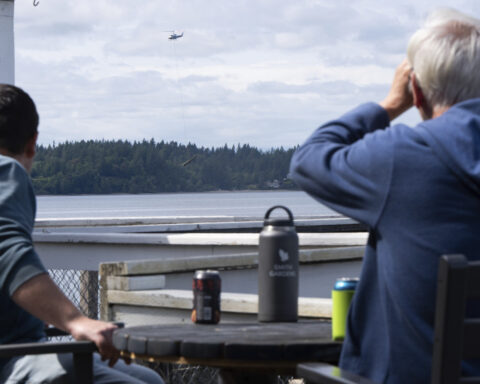 Flying boats make for a rare sight as Washington clears an island of derelict vessels by helicopter
