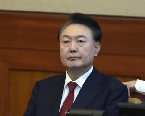 South Korean lawmakers approve special investigations into martial law and Yoon's wife