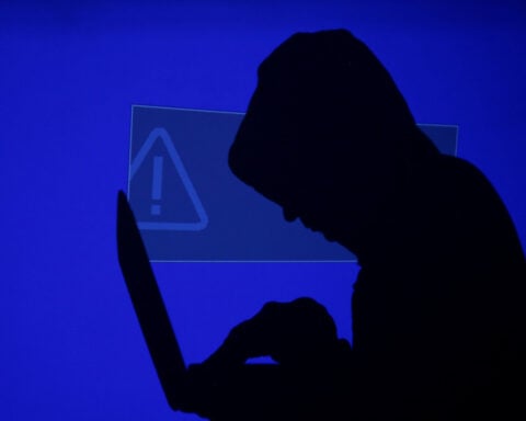 China offers cash rewards for hackers it says are Taiwanese military
