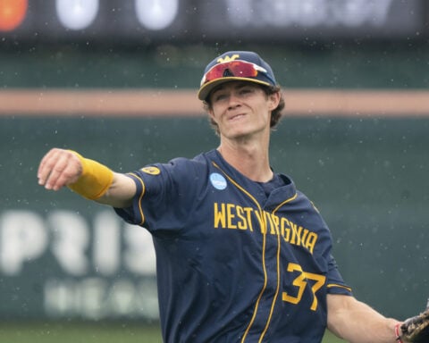 Utility player Armani Guzman leads West Virginia into 2nd straight NCAA super regional