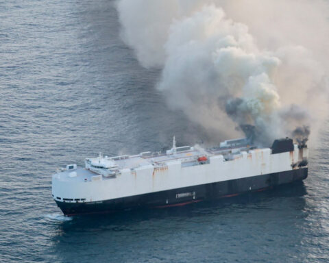 Burning cargo ship carrying 3,000 vehicles abandoned off Alaska
