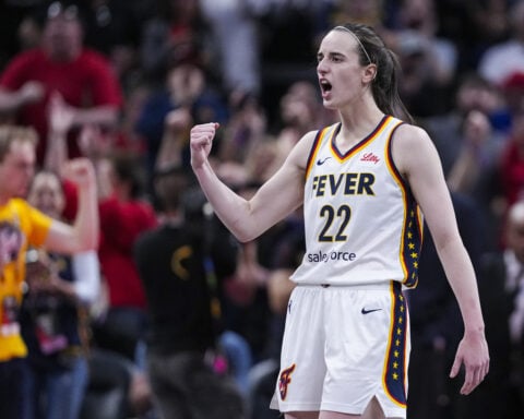 Caitlin Clark's quad strain will be re-evaluated this weekend. She considers herself day-to-day
