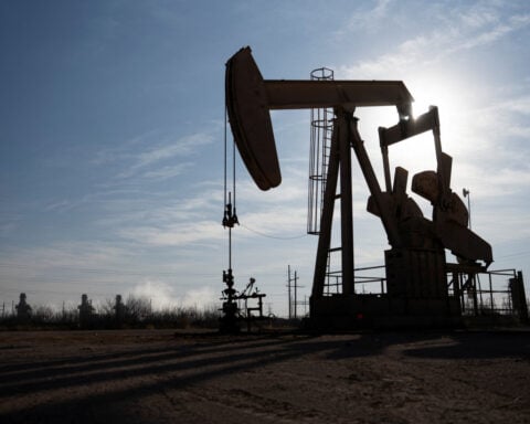 Crude climbs on US jobs report, China talks