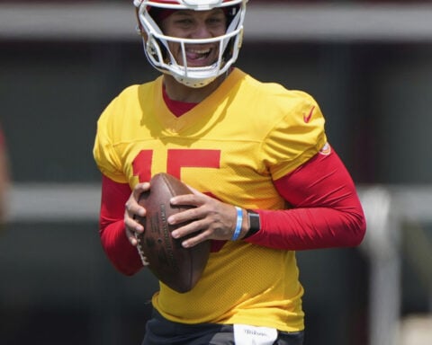 Chiefs QB Patrick Mahomes, Texas Tech hoops and football coaches cheering Red Raiders at WCWS