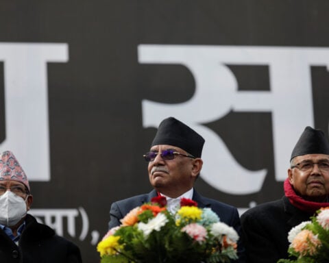 Nepal ex-PM faces graft charge over land deal with Indian yoga guru's firm