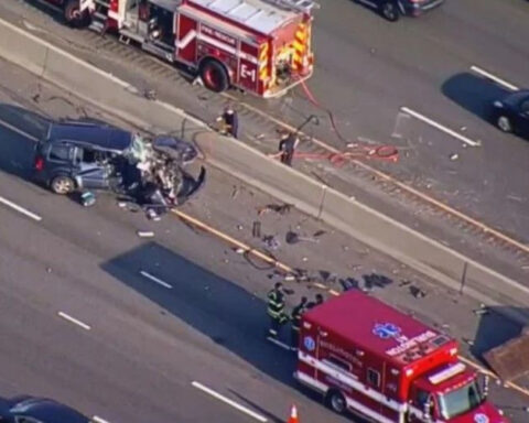 Crash sends large metal plates flying onto highway