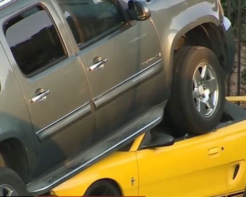 Mustang run over by SUV in Carmichael apartment complex parking lot crash