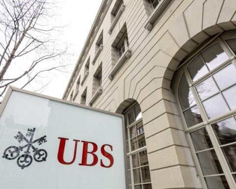 Shaken by crises, Switzerland fetters UBS's global dream