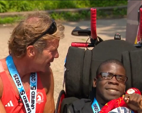 Woodbury runner with cerebral palsy gifted customized running chair