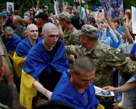 Soldiers return home after years in captivity as Ukraine-Russia prisoner swap begins