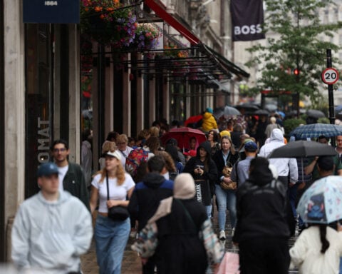 UK shoppers slow spending after April bounce, surveys show
