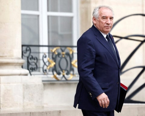 France to test adding security gates at schools after aide stabbed to death, PM says