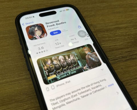 Hong Kong police accuse a mobile game app of promoting armed revolution