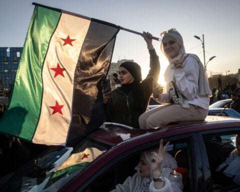 Syria orders women to cover up on beaches with conservative new dress code