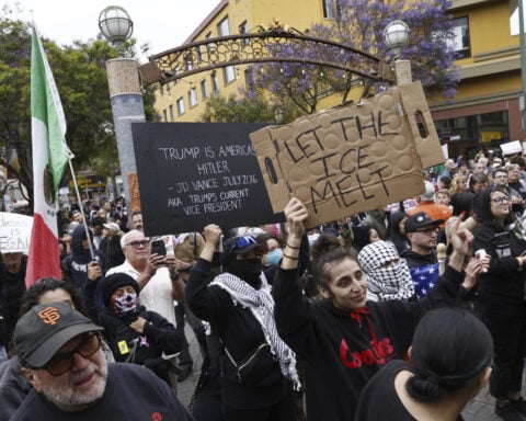 Protests over immigration raids pop up across the US with more planned