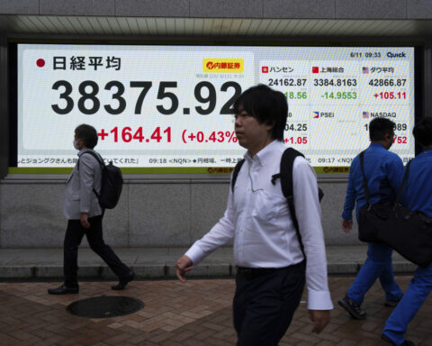 Asia shares climb after China and the US say they have a framework for seeking a trade deal