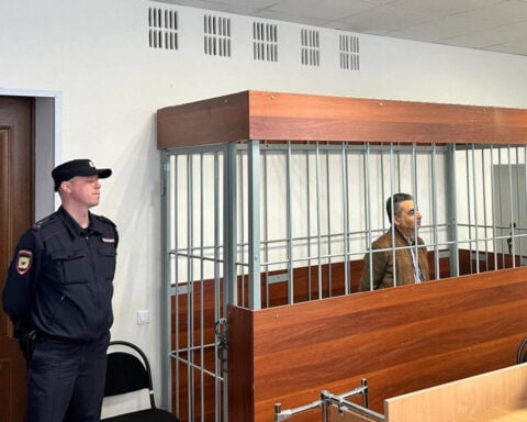 Russian court orders house arrest of politician it says discredited the Russian army