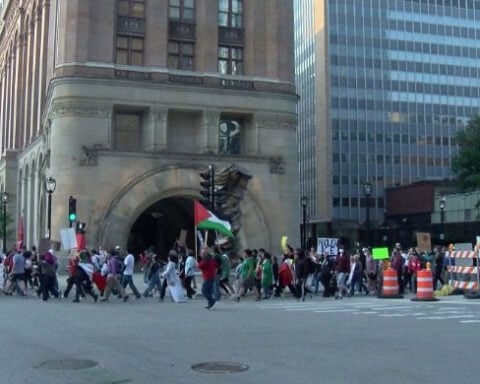 More than 1,000 people protest Trump and ICE immigration policies, then march through downtown Milwaukee
